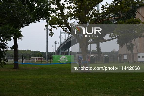 Three people are being shot, with one dead, at a migrant shelter on Randalls Island in Manhattan, New York, United States, on July 29, 2024....