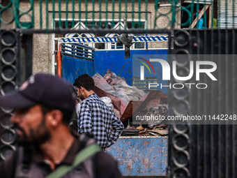 Government officials are inspecting the scrap site where 4 people died after an explosion in Sopore District, Baramulla, Jammu and Kashmir,...