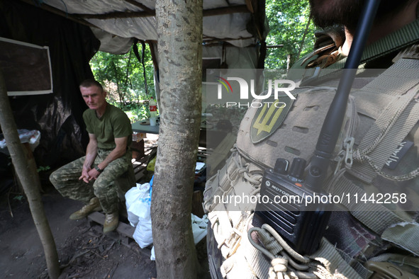 Pavlo is commanding a squad at the Shkval (Squall) Battalion in Ukraine, on July 26, 2024. Former prisoners who volunteered to defend Ukrain...