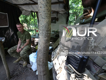 Pavlo is commanding a squad at the Shkval (Squall) Battalion in Ukraine, on July 26, 2024. Former prisoners who volunteered to defend Ukrain...