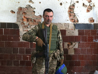 A serviceman who goes by the call sign Tkach is serving as a member of the Shkval (Squall) Battalion in Ukraine, on July 26, 2024. Former pr...