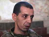 A serviceman who goes by the call sign Budulai is a Shkval (Squall) Battalion member in Ukraine, on July 26, 2024. Former prisoners who volu...