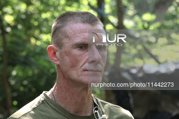 Pavlo is commanding a squad at the Shkval (Squall) Battalion in Ukraine, on July 26, 2024. Former prisoners who volunteered to defend Ukrain...