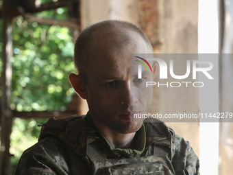 A serviceman who goes by the call sign Psykh is a Shkval (Squall) Battalion member in Ukraine, on July 26, 2024. Former prisoners who volunt...