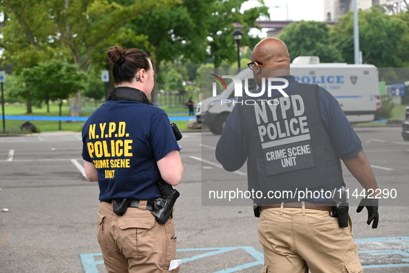 Three people are being shot, with one dead near a New York City-run migrant shelter on Randall's Island in Manhattan, New York, United State...