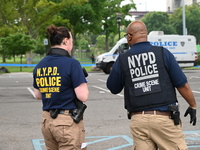 Three people are being shot, with one dead near a New York City-run migrant shelter on Randall's Island in Manhattan, New York, United State...