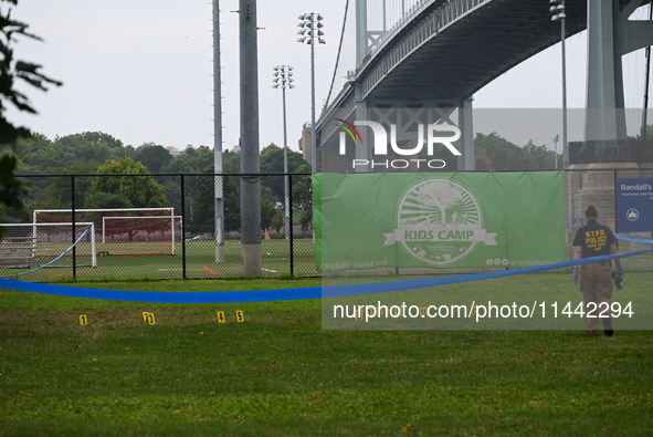 Three people are being shot, with one dead near a New York City-run migrant shelter on Randall's Island in Manhattan, New York, United State...