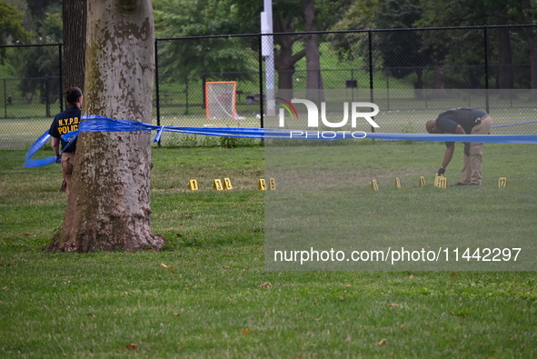 Three people are being shot, with one dead near a New York City-run migrant shelter on Randall's Island in Manhattan, New York, United State...