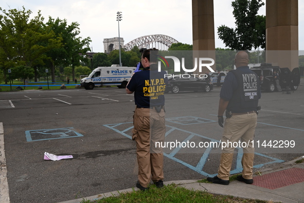 Three people are being shot, with one dead near a New York City-run migrant shelter on Randall's Island in Manhattan, New York, United State...