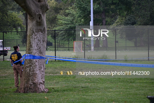 Three people are being shot, with one dead near a New York City-run migrant shelter on Randall's Island in Manhattan, New York, United State...