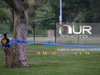 Three people are being shot, with one dead near a New York City-run migrant shelter on Randall's Island in Manhattan, New York, United State...