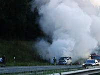 A car is seen on fire at the highway in Belgium on July 28, 2024. (