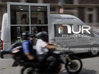 The relics of St. Jude Thaddeus are cycling along Av. 5 de Mayo in Mexico City, Mexico, on their way to the Metropolitan Cathedral. (