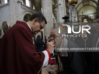 A Mass is being held where the relics of St. Jude Thaddeus are being exhibited inside the Metropolitan Cathedral in Mexico City, Mexico, on...