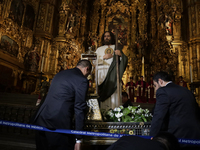 A group of people is arranging relics of St. Jude Thaddeus inside the Metropolitan Cathedral in Mexico City, Mexico, a work being carried ou...