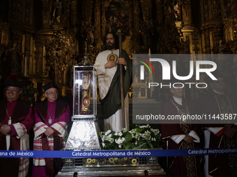 I am viewing the relics of St. Jude Thaddeus inside the Metropolitan Cathedral in Mexico City, Mexico, on a work carried out jointly by the...