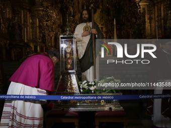 I am viewing the relics of St. Jude Thaddeus inside the Metropolitan Cathedral in Mexico City, Mexico, on a work carried out jointly by the...