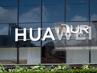 The logo of the Huawei Store is on the South Bund in Huangpu District in Shanghai, China, on July 30, 2024. (