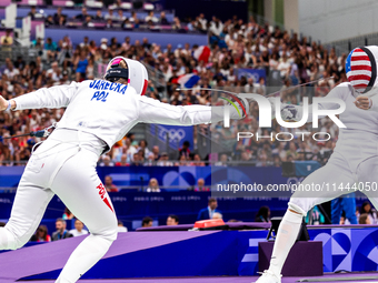 Aleksandra Jarecka of Team Poland and Margherita Guzzi Vincenti of Team United States compete during the Women's Epee Team Table of 8 match...