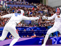 Aleksandra Jarecka of Team Poland and Margherita Guzzi Vincenti of Team United States compete during the Women's Epee Team Table of 8 match...