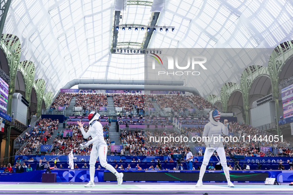 Aleksandra Jarecka of Team Poland and Anne Cebula  of Team United States compete during the Women's Epee Team Table of 8 match between Team...