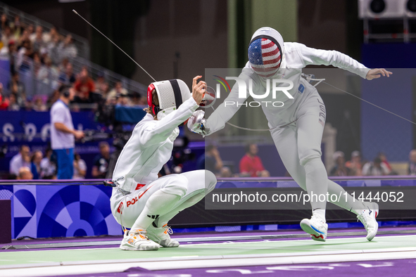 Alicja Klasik  of Team Poland and Margherita Guzzi Vincenti of Team United States compete during the Women's Epee Team Table of 8 match betw...