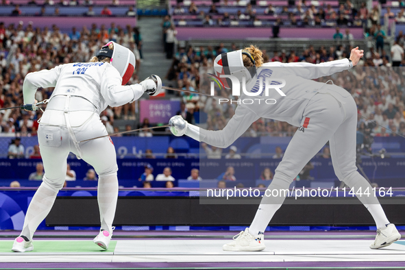 Aleksandra Jarecka of Team Poland and Auriane Mallo - Breton   of France  compete during the Women's Epee Team Semifinal 2, Match 8 match be...