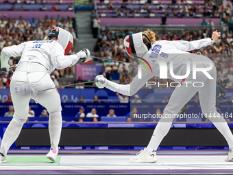 Aleksandra Jarecka of Team Poland and Auriane Mallo - Breton   of France  compete during the Women's Epee Team Semifinal 2, Match 8 match be...