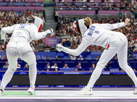 Aleksandra Jarecka of Team Poland and Auriane Mallo - Breton   of France  compete during the Women's Epee Team Semifinal 2, Match 8 match be...