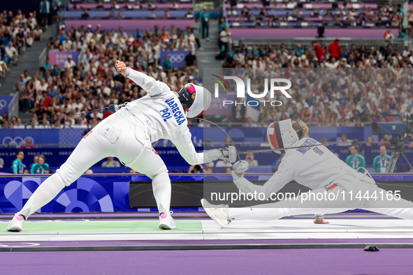 Aleksandra Jarecka of Team Poland and Auriane Mallo - Breton   of France  compete during the Women's Epee Team Semifinal 2, Match 8 match be...