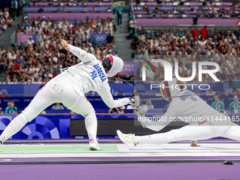 Aleksandra Jarecka of Team Poland and Auriane Mallo - Breton   of France  compete during the Women's Epee Team Semifinal 2, Match 8 match be...