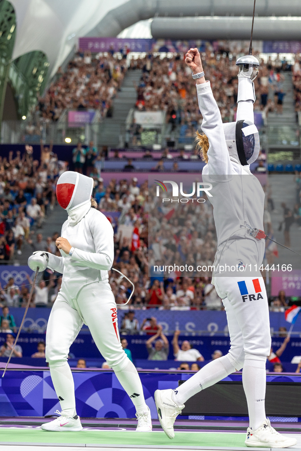 Aleksandra Jarecka of Team Poland and Auriane Mallo - Breton   of France  compete during the Women's Epee Team Semifinal 2, Match 8 match be...