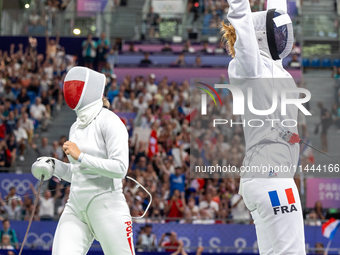 Aleksandra Jarecka of Team Poland and Auriane Mallo - Breton   of France  compete during the Women's Epee Team Semifinal 2, Match 8 match be...