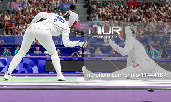 Aleksandra Jarecka of Team Poland and Auriane Mallo - Breton   of France  compete during the Women's Epee Team Semifinal 2, Match 8 match be...