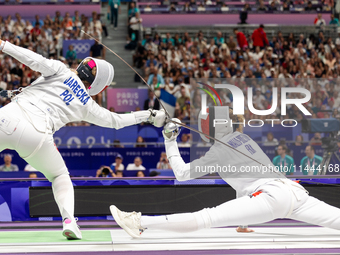 Aleksandra Jarecka of Team Poland and Auriane Mallo - Breton   of France  compete during the Women's Epee Team Semifinal 2, Match 8 match be...