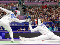 Aleksandra Jarecka of Team Poland and Auriane Mallo - Breton   of France  compete during the Women's Epee Team Semifinal 2, Match 8 match be...