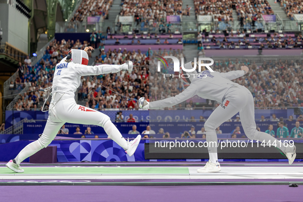 Aleksandra Jarecka of Team Poland and Auriane Mallo - Breton   of France  compete during the Women's Epee Team Semifinal 2, Match 8 match be...