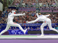 Aleksandra Jarecka of Team Poland and Auriane Mallo - Breton   of France  compete during the Women's Epee Team Semifinal 2, Match 8 match be...