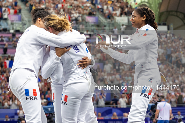 Team France is celebrating victory after the Women's Epee Team Semifinal 2, Match 8 match between Team Poland and Team France  on day four o...