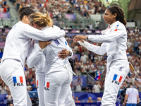 Team France is celebrating victory after the Women's Epee Team Semifinal 2, Match 8 match between Team Poland and Team France  on day four o...