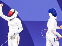  Renata Knapik-Miazga of Team Poland and  Caroline Vitalis  of France  compete during the Women's Epee Team Semifinal 2, Match 8 match betwe...