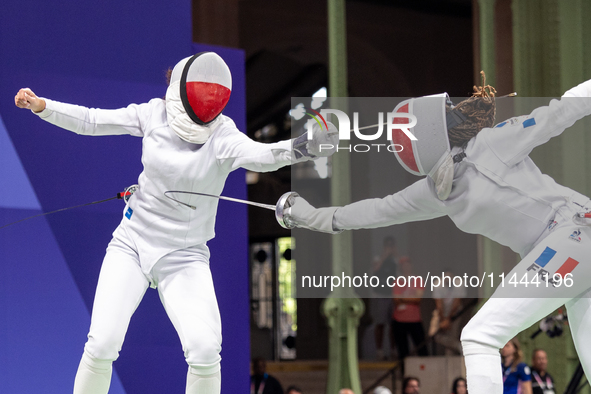  Renata Knapik-Miazga of Team Poland and  Caroline Vitalis  of France  compete during the Women's Epee Team Semifinal 2, Match 8 match betwe...