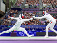  Renata Knapik-Miazga of Team Poland and  Mallo-Breton Auriane  of France  compete during the Women's Epee Team Semifinal 2, Match 8 match b...