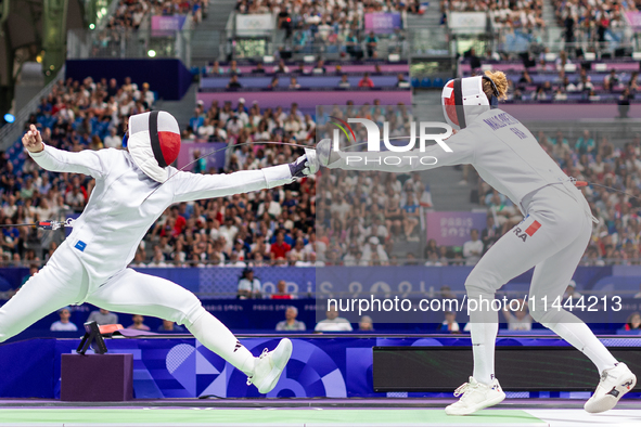  Renata Knapik-Miazga of Team Poland and  Mallo-Breton Auriane  of France  compete during the Women's Epee Team Semifinal 2, Match 8 match b...