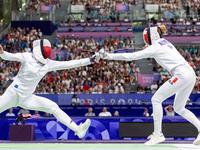  Renata Knapik-Miazga of Team Poland and  Mallo-Breton Auriane  of France  compete during the Women's Epee Team Semifinal 2, Match 8 match b...