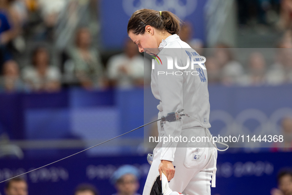 Katharine Holmes of Team United States  reacts after losing a match  during the Women's Epee Team Classifications 5-8, Match 6,  match betwe...