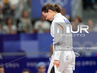 Katharine Holmes of Team United States  reacts after losing a match  during the Women's Epee Team Classifications 5-8, Match 6,  match betwe...