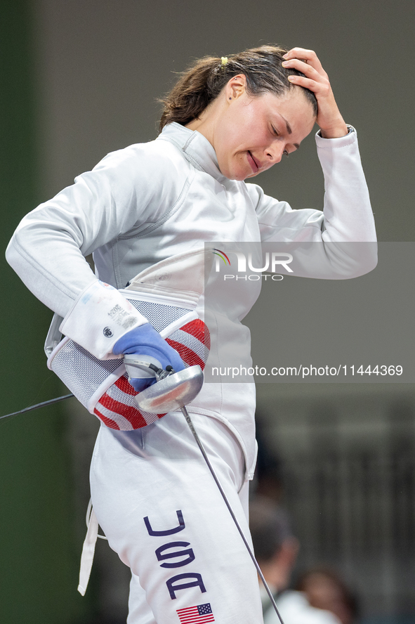 Katharine Holmes of Team United States  reacts after losing a match  during the Women's Epee Team Classifications 5-8, Match 6,  match betwe...