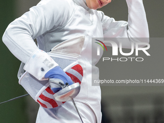 Katharine Holmes of Team United States  reacts after losing a match  during the Women's Epee Team Classifications 5-8, Match 6,  match betwe...