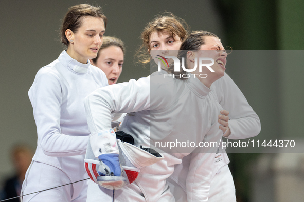 Katharine Holmes of Team United States  reacts after losing a match  during the Women's Epee Team Classifications 5-8, Match 6,  match betwe...